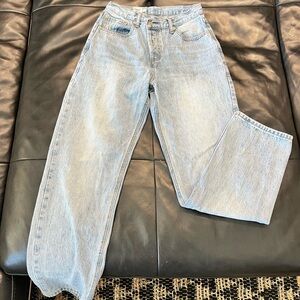 Light wash Princess Polly asymmetric straight leg jeans